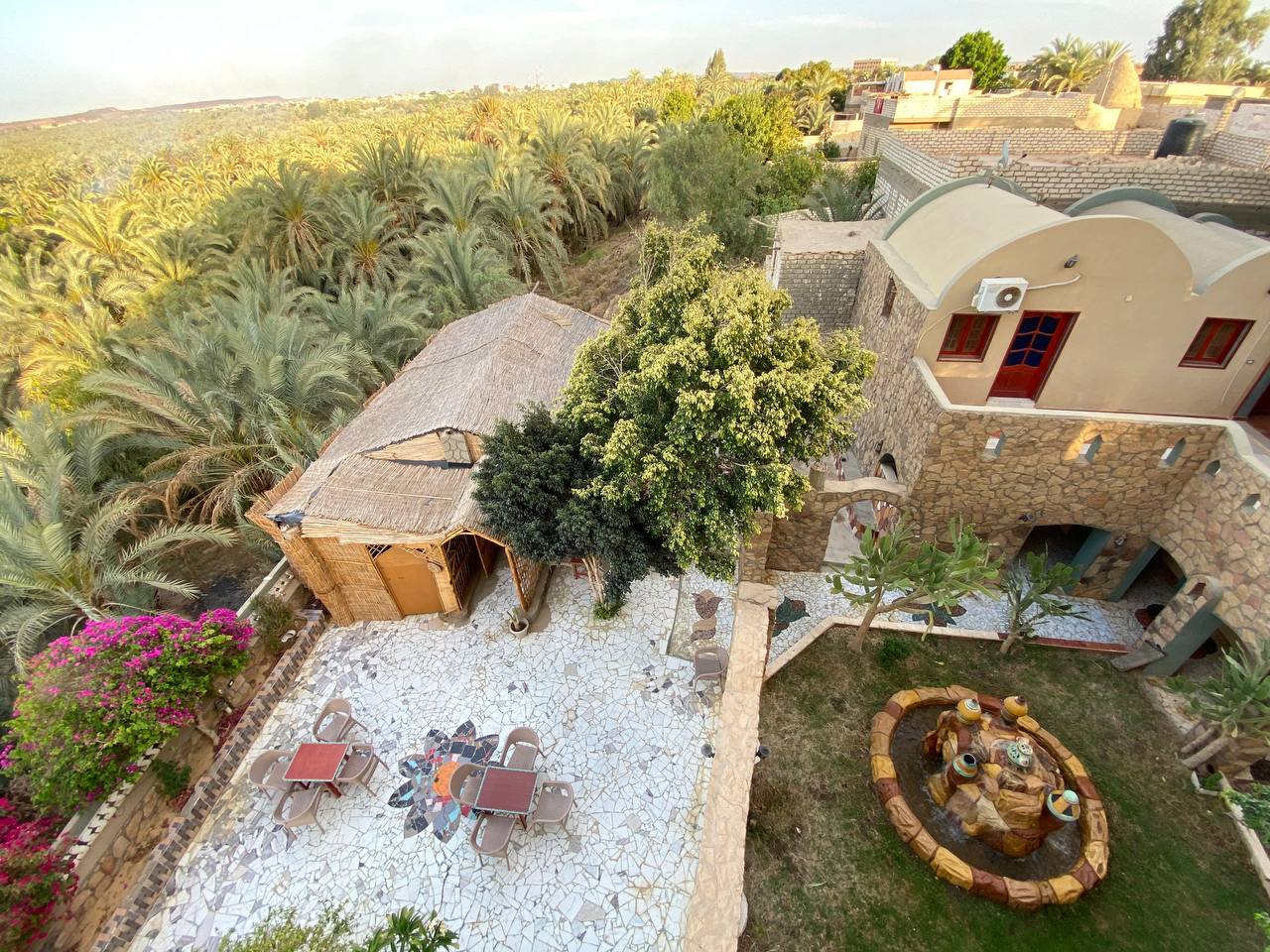 Hotel courtyard overlooking Bahariya Oasis palm groves