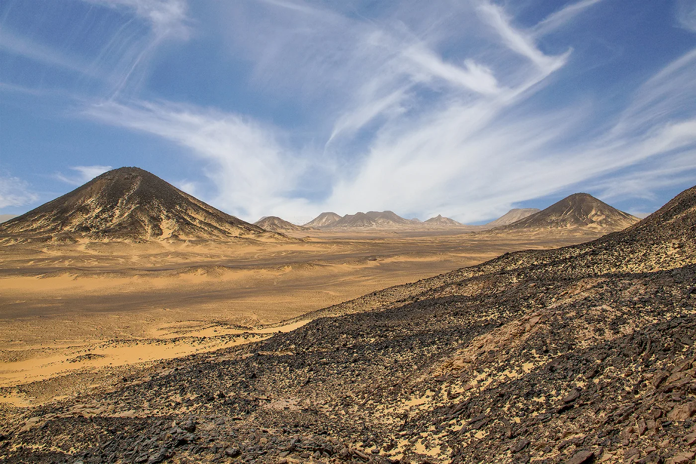 Black volcanic hills of the Black Desert near Bahariya Oasis Egypt